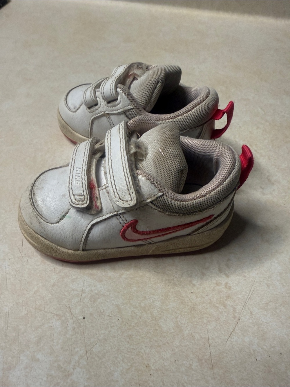Nike Kids White Sneakers with Pink Swoosh